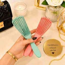 برس مو حرفه ای صورتی وسبز با دندانه‌های انعطاف پذیر برای باز کردن گره مو
