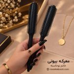 معرفی برس حالت‌ دهنده مو حرفه‌ای معرکه بیوتی مدل مشکی در دست