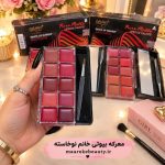 جعبه و بسته‌بندی اصلی پالت رژ لب آرت اسکین مدل A و B در کنار یکدیگر روی میز آرایشی